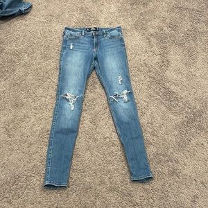 Blue ripped skinny jeans